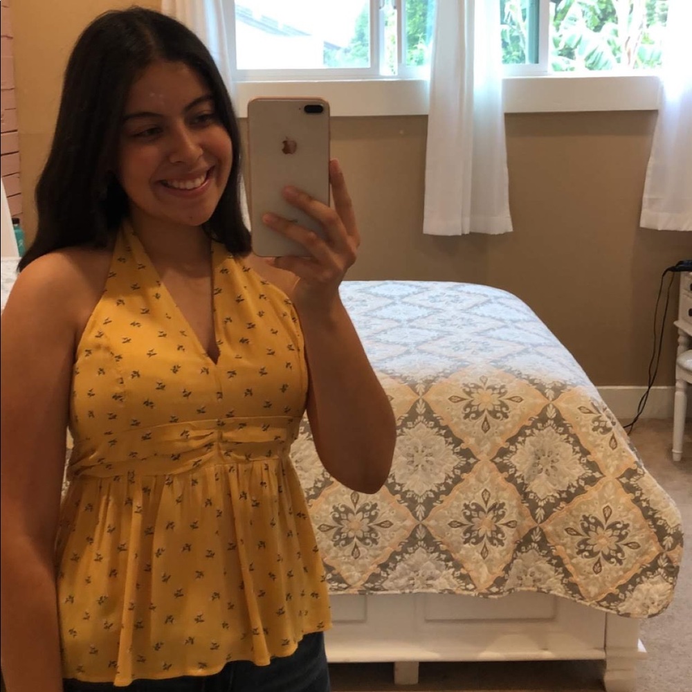 Yellow blouse with flowers